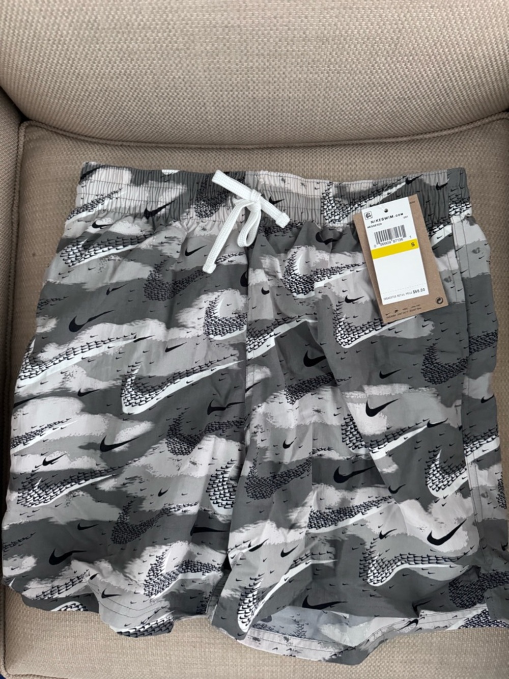 Men’s Nike Gray Camouflage Swim Logo Print Shorts, size small.